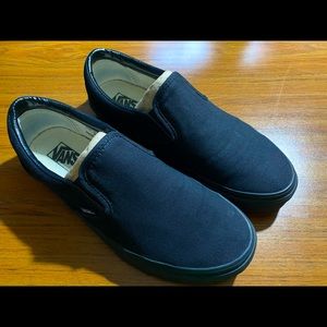 Men’s Vans size 9 w/10.5 Black/Black slip on.